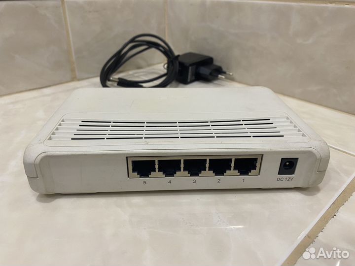 Коммутатор asus GigaX1005B