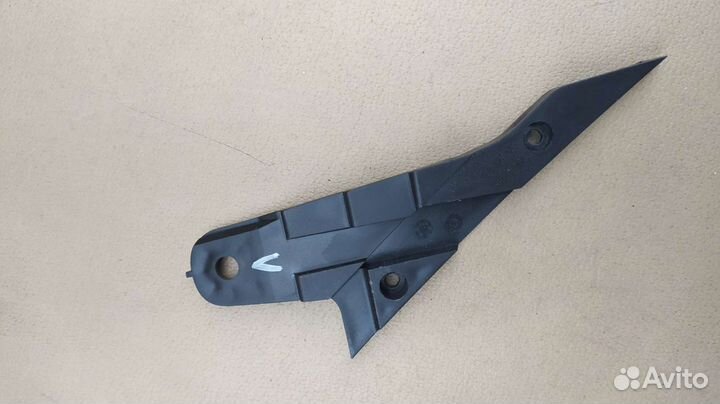 Крепление фары Opel Astra H