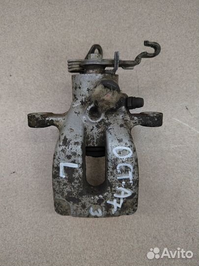 Суппорт задний левый Skoda Octavia A7