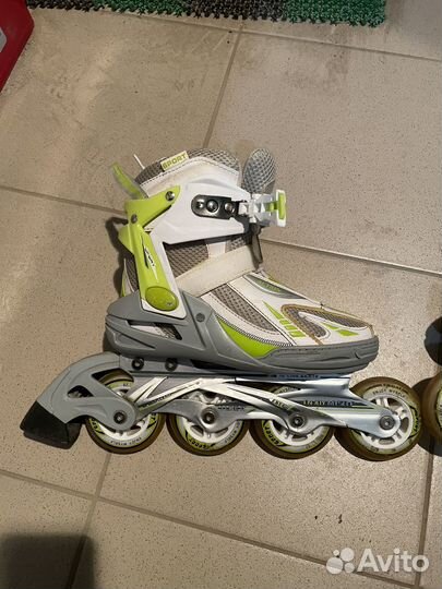 Роликовые коньки