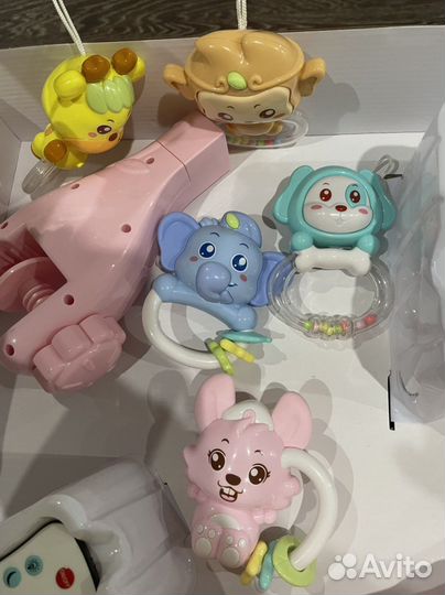 Рабочий Мобиль в кроватку розовый с пультом