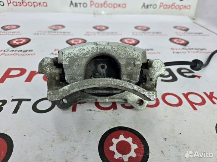 Суппорт передний левый Geely Coolray SX11 Джили Ку