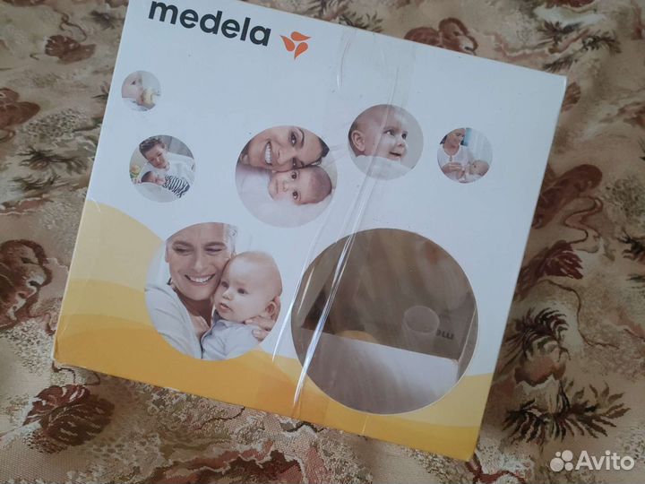 Молокоотсос Medela электрический