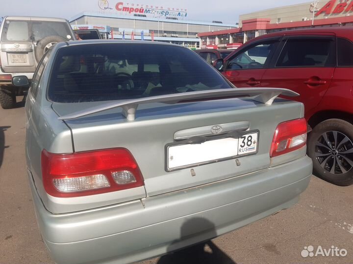 Спойлер Toyota Carina 210