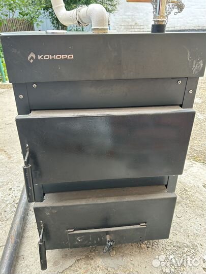 Котел на твердом топливе Конорд