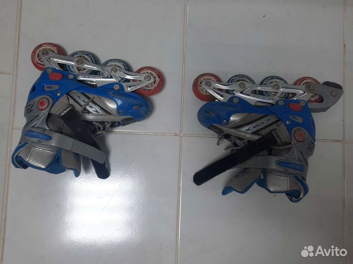 Роликовые коньки