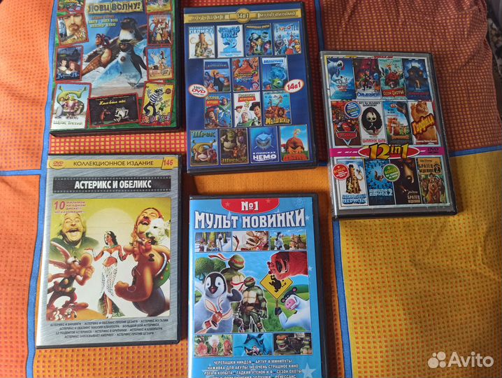 Диски DVD с фильмами и сериалами