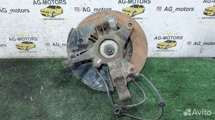 Кулак поворотный передний правый CX-7 2.3