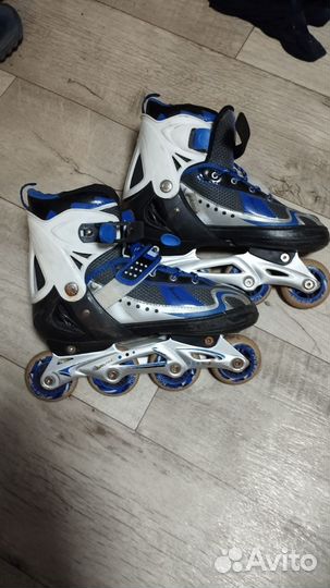 Роликовые коньки