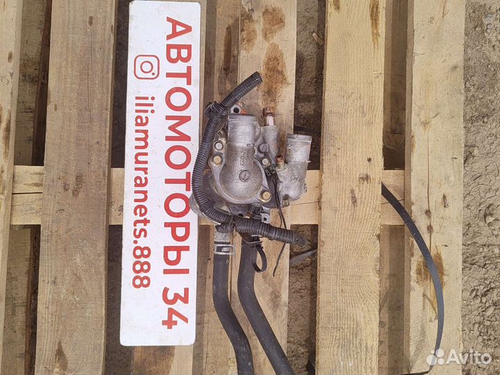 Корпус термостата mitsubishi lancer 10