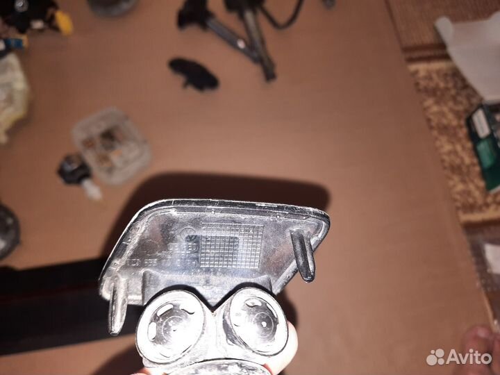 Форсунка омывателя фар правая VAG VW Passat B6