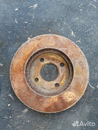 Тормозной диск передний Nissan March K12