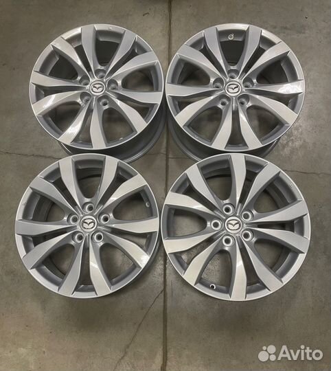 Продам Диски Mazda R18