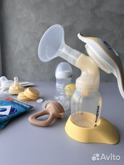 Молокоотсос medela ручной с соской, накладки