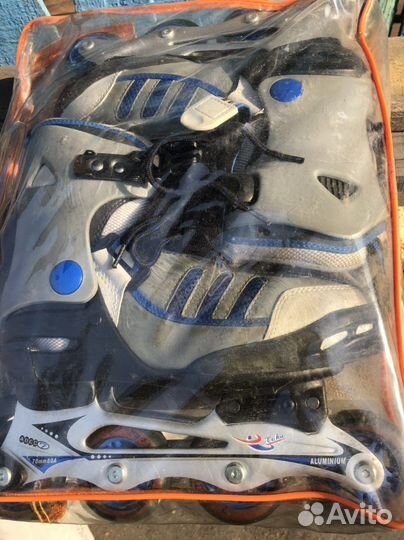 Роликовые коньки