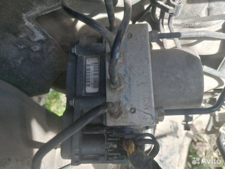 Блок ABS Nissan Tiida 2009