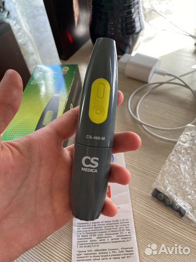 Электрическая зубная щетка