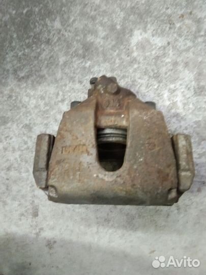 Суппорта передние Мазда 3 BK