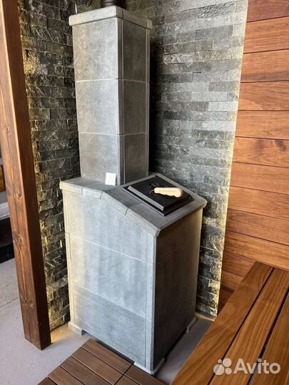 Чугунная печь для бани Гроза Технолит в камне