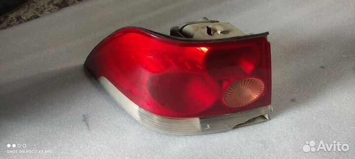 Фонарь задний левый opel astra h седан