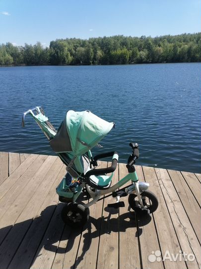 Коляска трёх колёсная