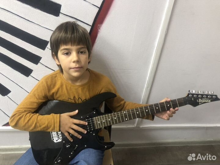 Игра на гитаре, обучаем детей с нуля