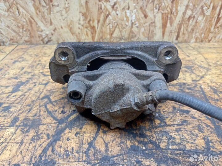 Суппорт тормозной передний левый Renault Duster