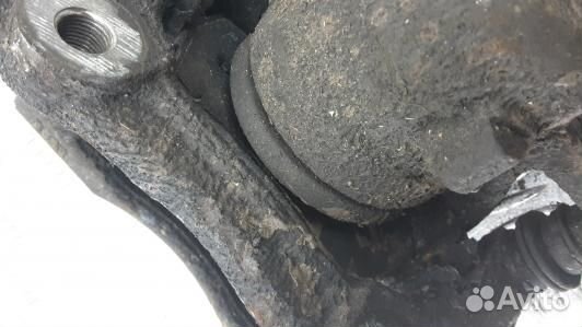 Суппорт тормозной передний левый nissan note E11