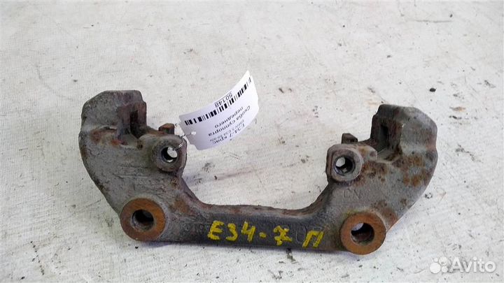 Скоба суппорта переднего BMW 5 E34 88-95г