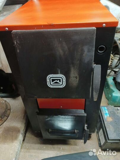 Твердотопливный котел длительного горения новый