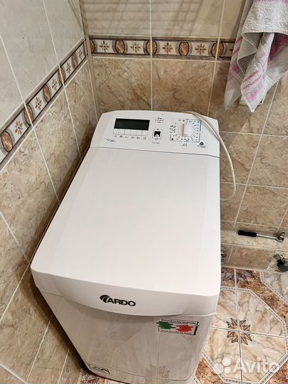 Стиральная машина с вертикальной загрузкой