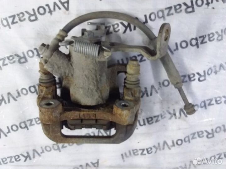 Суппорт задний левый Daewoo Nexia N150 16кл