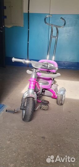 Трехколесный велосипед с родительской ручкой
