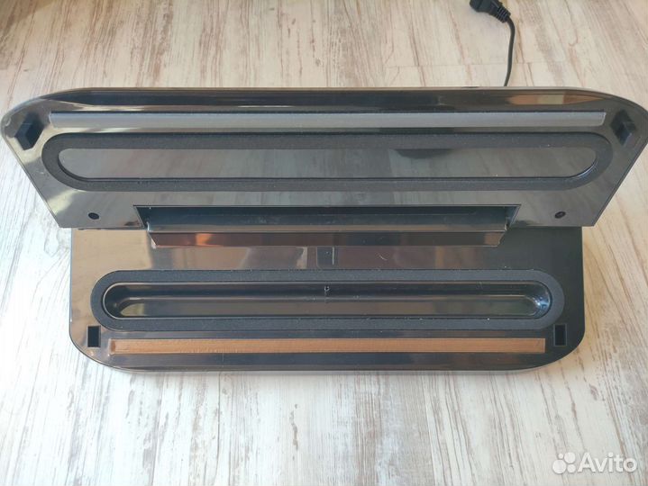 Вакуумная упаковочная машина