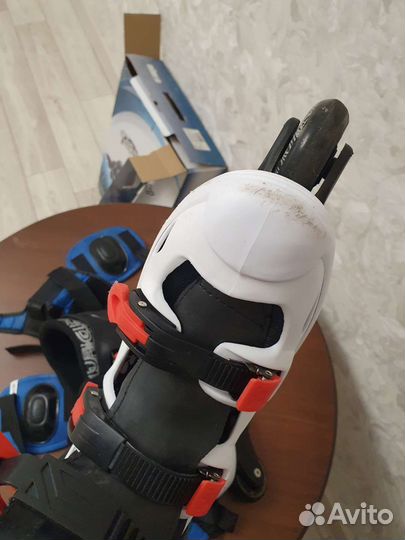 Роликовые коньки