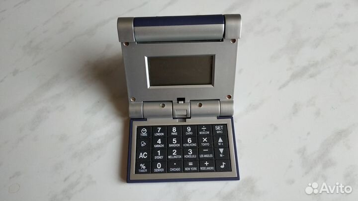 Калькулятор-трансформер с календарем, часами