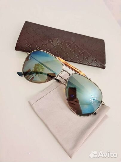 Солнцезащитные очки Gucci