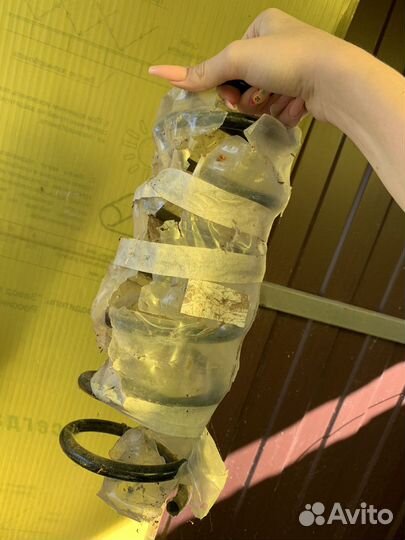 Пружина задняя