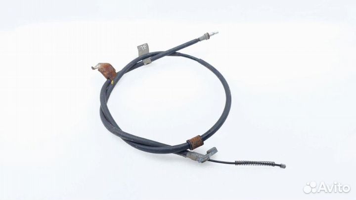 Трос стояночного тормоза задний левый Nissan