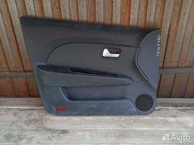 Обшивка двери передняя левая Chery А13