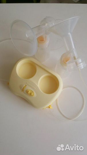 Молокоотсос Medela электрический