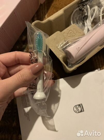 Электрическая зубная щетка philips