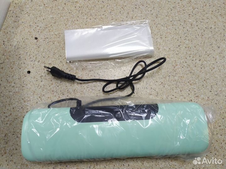 Вакуумный упаковщик вакууматор