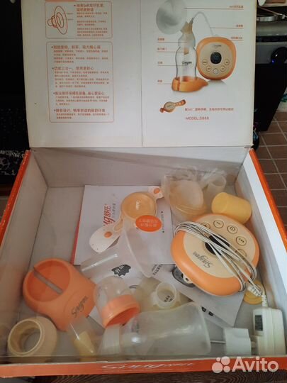 Молокоотсос электрический