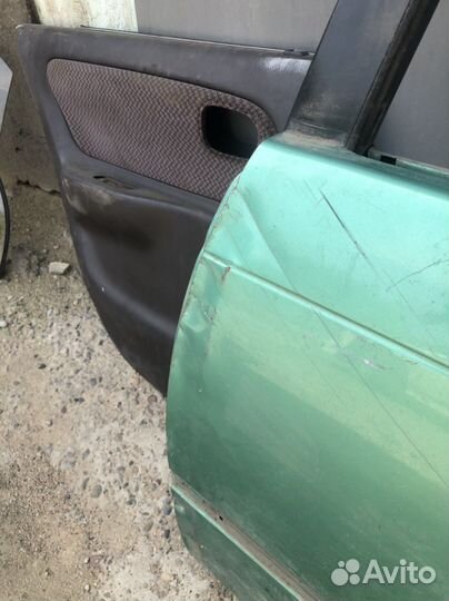 Дверь задняя левая corolla 100
