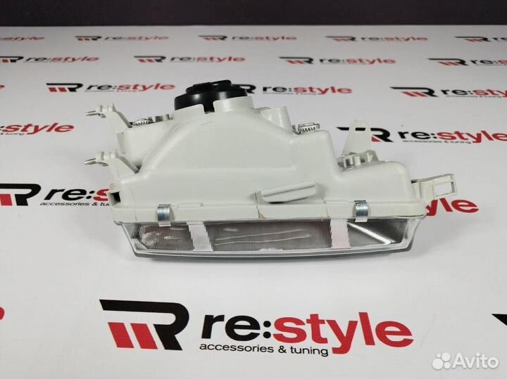 Фара Toyota Corolla Touring Левая Хрусталь U2307