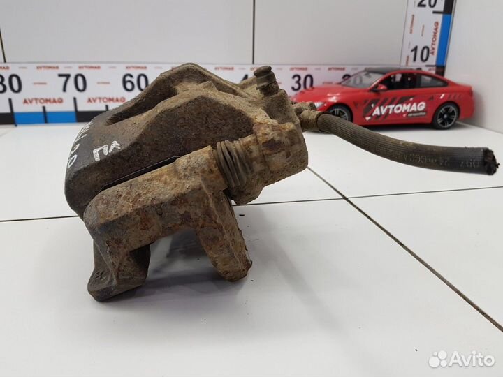 Суппорт передний левый (SsangYong Actyon)