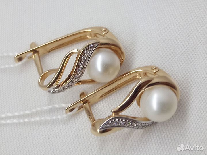 Золотые серьги с камнем