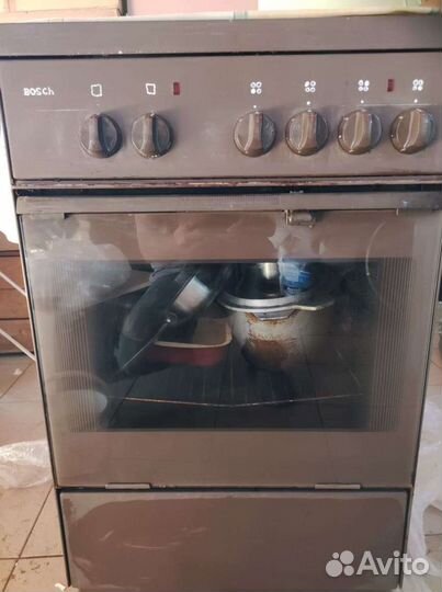 Электрическая плита 4 конфорки с духовкой