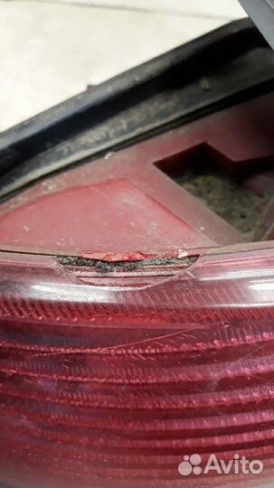 Фонарь левый Peugeot 206